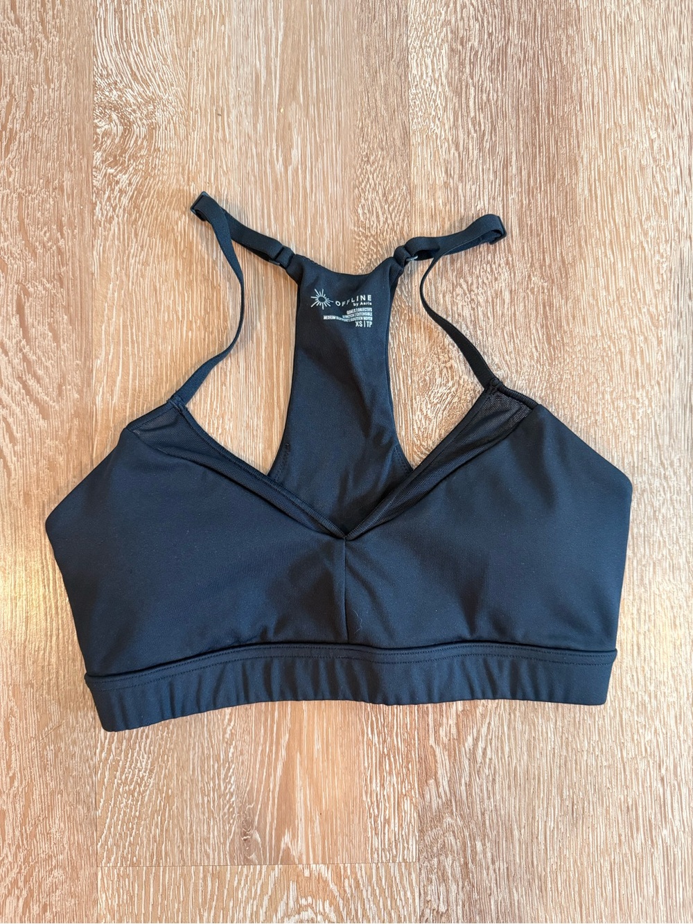 Aerie offline black racer back sports bra 
Size XS